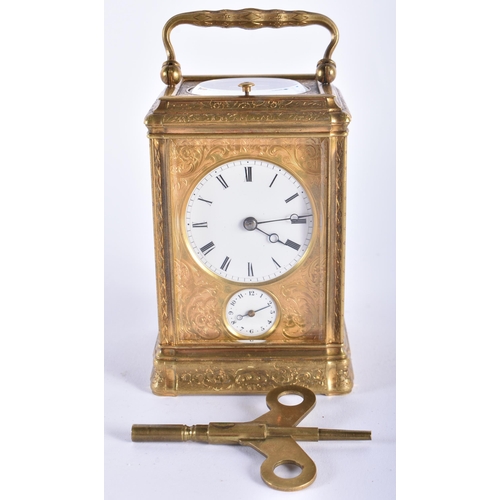 24 - A FINE 19TH CENTURY FRENCH GILT BRASS REPEATING CARRIAGE CLOCK beautifully engraved with foliage and... 