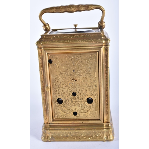 24 - A FINE 19TH CENTURY FRENCH GILT BRASS REPEATING CARRIAGE CLOCK beautifully engraved with foliage and... 