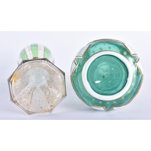 25 - AN ANTIQUE BOHEMIAN GLASS VASE together with a similar bottle. Largest 20 cm high. (2)