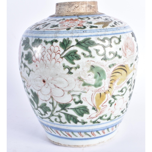 254 - A 17TH CENTURY CHINESE WUCAI PORCELAIN TRANSITIONAL JAR Shunzhi, painted with playful Buddhistic lio... 