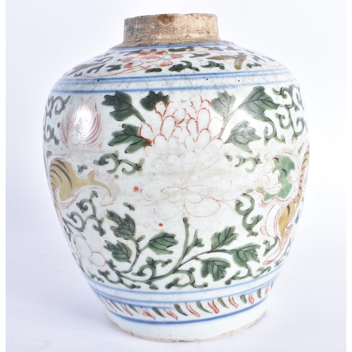 254 - A 17TH CENTURY CHINESE WUCAI PORCELAIN TRANSITIONAL JAR Shunzhi, painted with playful Buddhistic lio... 