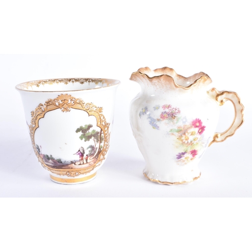 256 - AN 18TH CENTURY MEISSEN PORCELAIN FLARED TEABOWL together with a later jug. Largest 7.25 cm high. (2... 