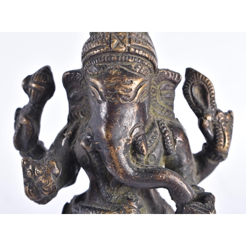 258 - A 19TH CENTURY INDIAN BRONZE FIGURE OF GANESHA modelled upon a square form base. 16 cm high.