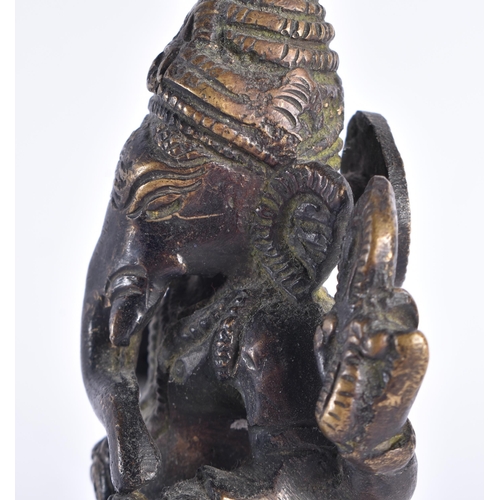 258 - A 19TH CENTURY INDIAN BRONZE FIGURE OF GANESHA modelled upon a square form base. 16 cm high.