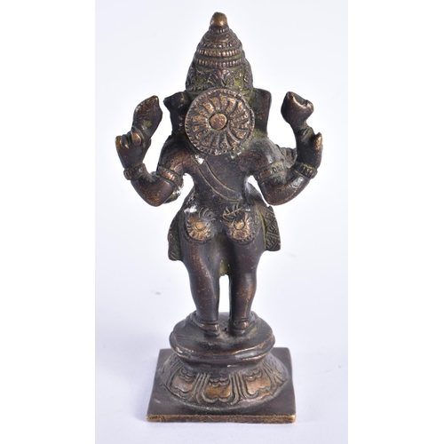 258 - A 19TH CENTURY INDIAN BRONZE FIGURE OF GANESHA modelled upon a square form base. 16 cm high.