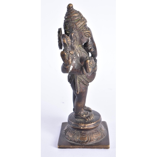 258 - A 19TH CENTURY INDIAN BRONZE FIGURE OF GANESHA modelled upon a square form base. 16 cm high.