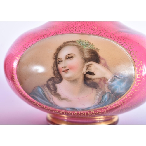 26 - A PAIR OF 19TH CENTURY BOHEMIAN CRANBERRY GLASS VASES painted with portraits of females. 25 cm high.