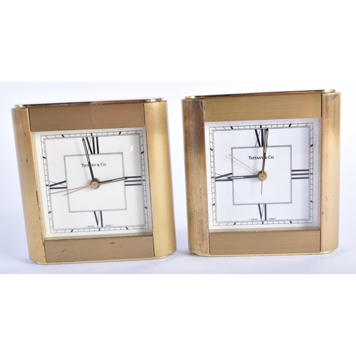 28 - TWO TIFFANY & CO BRASS CLOCKS. 10.5 cm x 9.75 cm. (2)