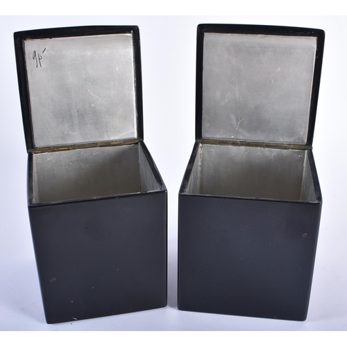 31 - A PAIR OF ANTIQUE RUSSIAN BLACK LACQUER TROIKA TEA CADDIES. 13 cm x 10 cm.