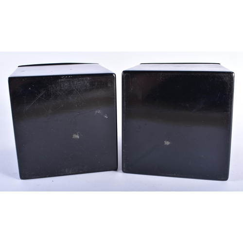 31 - A PAIR OF ANTIQUE RUSSIAN BLACK LACQUER TROIKA TEA CADDIES. 13 cm x 10 cm.