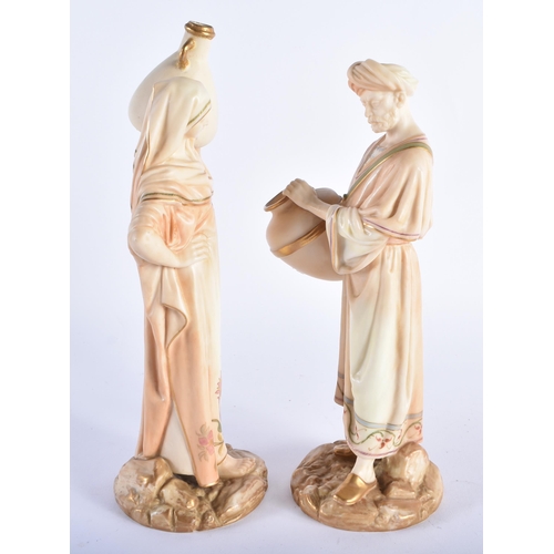 35 - A PAIR OF ROYAL WORCESTER BLUSH IVORY PORCELAIN FIGURES. 24 cm high.