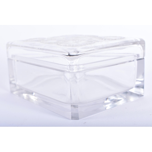 37 - A FRENCH LALIQUE GLASS BOX AND COVER. 10 cm x 8.5 cm.
