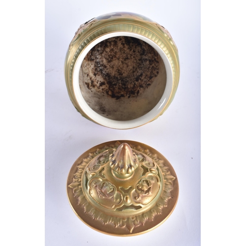 42 - A ROYAL WORCESTER POT POURRI AND COVER painted with flowers. 18 cm x 12 cm.