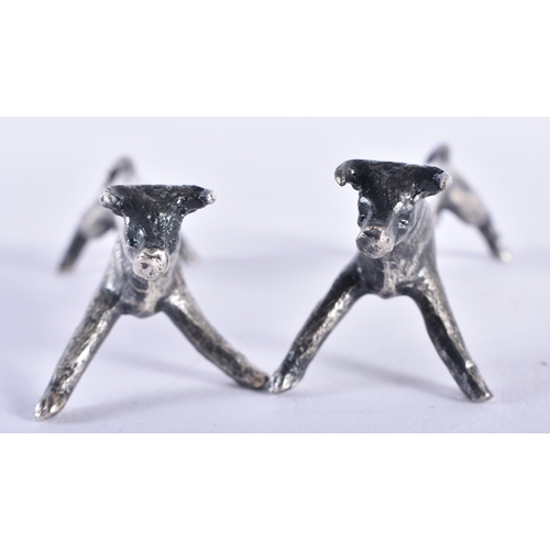 44 - A PAIR OF ART DECO SILVER PLATED BULL KNIFE RESTS. 9 cm wide.