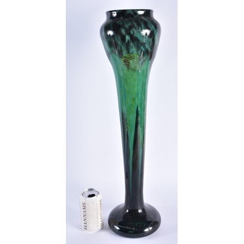 46 - A VERY LARGE FRENCH DAUM NANCY GREEN GLASS VASE of organic scrolling form. 59 cm high.