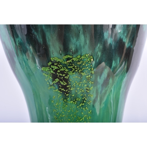 46 - A VERY LARGE FRENCH DAUM NANCY GREEN GLASS VASE of organic scrolling form. 59 cm high.