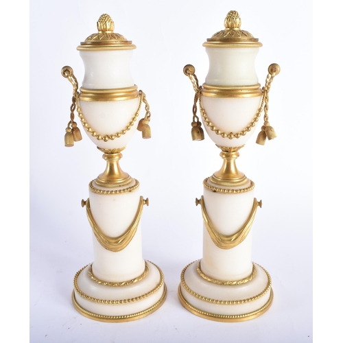 49 - A FINE PAIR OF EARLY 19TH CENTURY FRENCH ORMOLU AND MARBLE CASSOLETTES mounted in draped swags and r... 