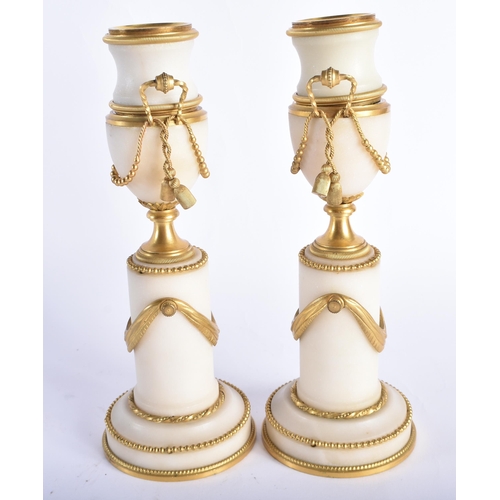 49 - A FINE PAIR OF EARLY 19TH CENTURY FRENCH ORMOLU AND MARBLE CASSOLETTES mounted in draped swags and r... 