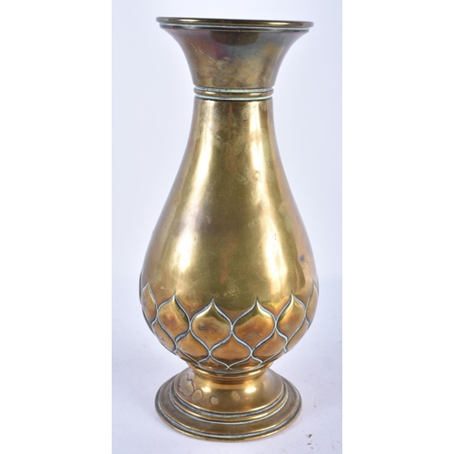 499 - AN 18TH/19TH CENTURY PERSIAN BRONZE VASE decorated in relief with motifs. 26 cm high.