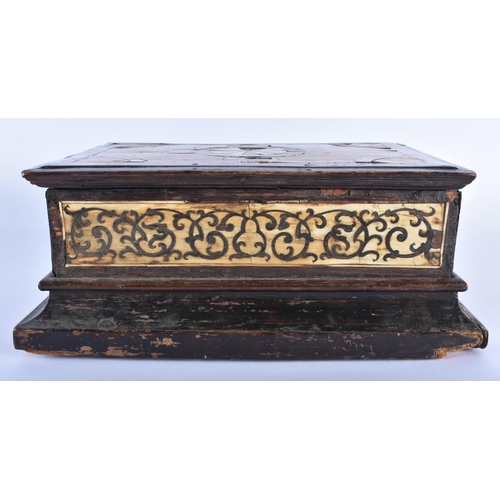 502 - AN EARLY 18TH CENTURY ITALIAN CARVED WOOD CASKET inlaid with bone. 28 cm x 18 cm.