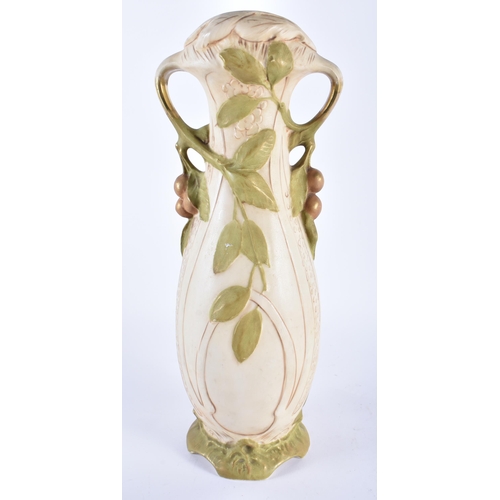 53 - AN AUSTRIAN ROYAL DUX TWIN HANDLED POTTERY GRAPE VASE. 41 cm high.