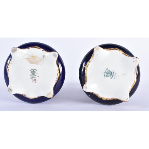 541 - A PAIR OF COALPORT PORCELAIN FLARED VASES. 11 cm high.