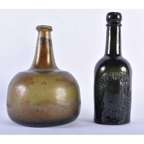 546 - A 17TH/18TH CENTURY IRIDESCENT GLASS ONION FORM WINE BOTTLE together with a later Wickham & Co Ltd b... 