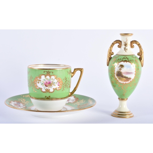 548 - A COALPORT CUP AND SAUCER together with a Coalport vase. Largest 11 cm high. (3)