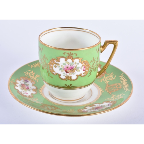 548 - A COALPORT CUP AND SAUCER together with a Coalport vase. Largest 11 cm high. (3)