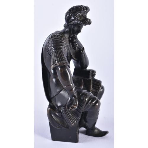 56 - A 19TH CENTURY EUROPEAN GRAND TOUR BRONZE FIGURE OF A MALE modelled in armour upon a stool. 12 cm hi... 