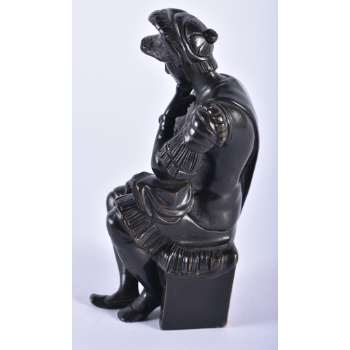 56 - A 19TH CENTURY EUROPEAN GRAND TOUR BRONZE FIGURE OF A MALE modelled in armour upon a stool. 12 cm hi... 