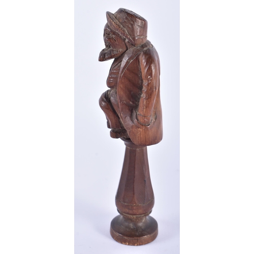 58 - AN ANTIQUE TREEN CARVED WOOD FIGURAL NUT CRACKER. 15.5 cm high.