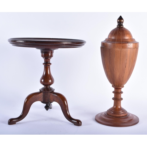 586 - A GEORGE III STYLE MIXED WOOD VASE AND COVER together with a miniature mahogany table. Largest 36 cm... 