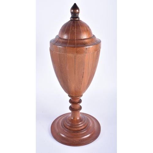 586 - A GEORGE III STYLE MIXED WOOD VASE AND COVER together with a miniature mahogany table. Largest 36 cm... 