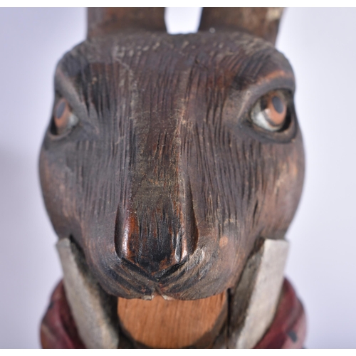 59 - A RARE ANTIQUE PAINTED WOOD TREEN PETER RABBIT NUT CRACKER together with another wood nut cracker. L... 