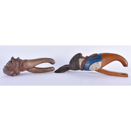 59 - A RARE ANTIQUE PAINTED WOOD TREEN PETER RABBIT NUT CRACKER together with another wood nut cracker. L... 