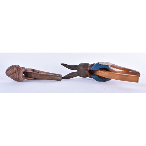 59 - A RARE ANTIQUE PAINTED WOOD TREEN PETER RABBIT NUT CRACKER together with another wood nut cracker. L... 