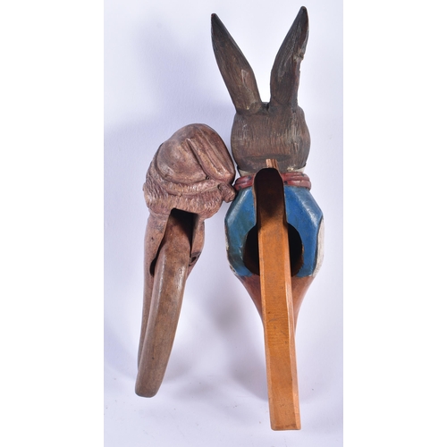 59 - A RARE ANTIQUE PAINTED WOOD TREEN PETER RABBIT NUT CRACKER together with another wood nut cracker. L... 