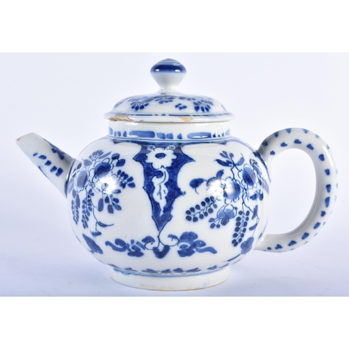 599 - AN 18TH CENTURY DELFT BLUE AND WHITE TIN GLAZED TEAPOT AND COVER painted with flowers. 19 cm wide.