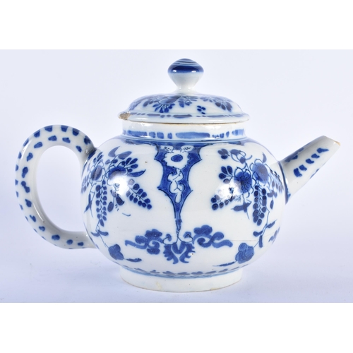 599 - AN 18TH CENTURY DELFT BLUE AND WHITE TIN GLAZED TEAPOT AND COVER painted with flowers. 19 cm wide.