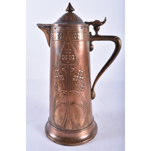 745 - A LATE 19TH CENTURY AUSTRIAN SECESSIONIST MOVEMENT COPPER JUG decorated with flowers. 28 cm high.