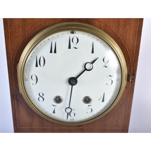 803 - AN ANTIQUE MAHOGANY MANTEL CLOCK together with an Atmos clock. Largest 38 cm high inc handle. (2)