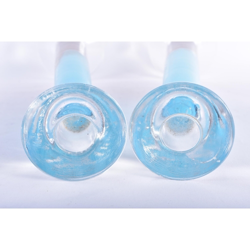 804 - A STYLISH PAIR OF ICEY BLUE GLASS CANDLE HOLDERS. 40 cm high.