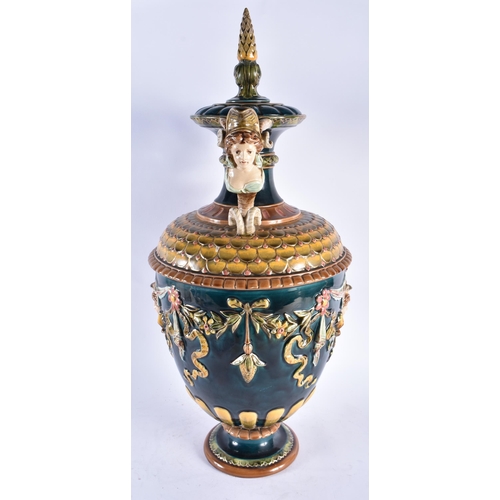 814 - A LARGE 19TH CENTURY AUSTRIAN MAJOLICA TWIN HANDLED VASE AND COVER decorated with mask heads. 62 cm ... 