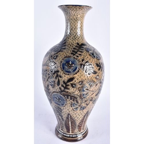 91 - A LARGE DOULTON STONEWARE BALUSTER VASE decorated with roundels and foliage. 38 cm high.