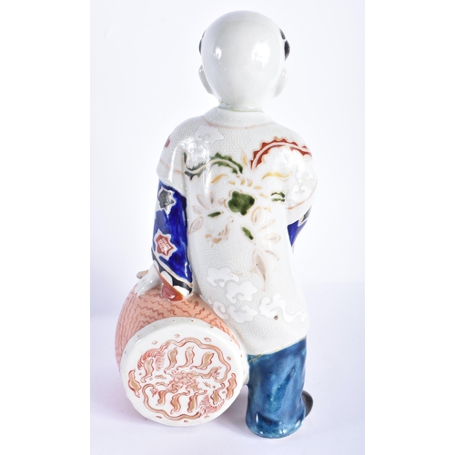 2017 - A 19TH CENTURY JAPANESE MEIJI PERIOD AO KUTANI PORCELAIN FIGURE OF A DRUMMER. 25 cm high.