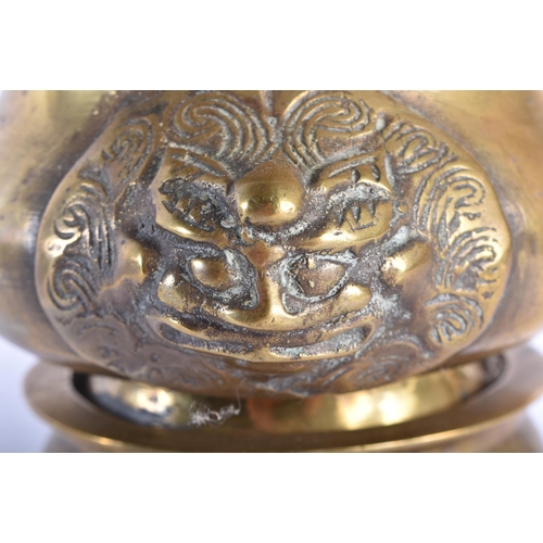 2020 - A 19TH CENTURY CHINESE TWIN HANDLED BRONZE CENSER ON STAND Late Qing. 14 cm wide. (2)