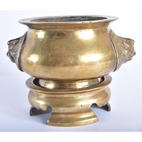 2020 - A 19TH CENTURY CHINESE TWIN HANDLED BRONZE CENSER ON STAND Late Qing. 14 cm wide. (2)