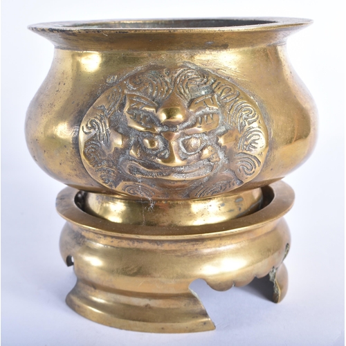 2020 - A 19TH CENTURY CHINESE TWIN HANDLED BRONZE CENSER ON STAND Late Qing. 14 cm wide. (2)