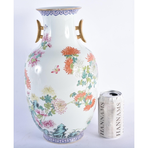 2093 - A LARGE CHINESE REPUBLICAN PERIOD TWIN HANDLED PORCELAIN VASE bearing Qianlong marks to base, painte... 